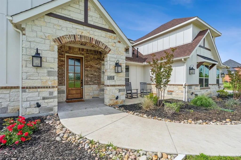 Stone cottage entry with arched door