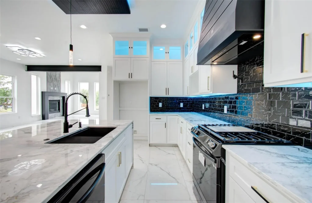 Modern kitchen with dark backsplash